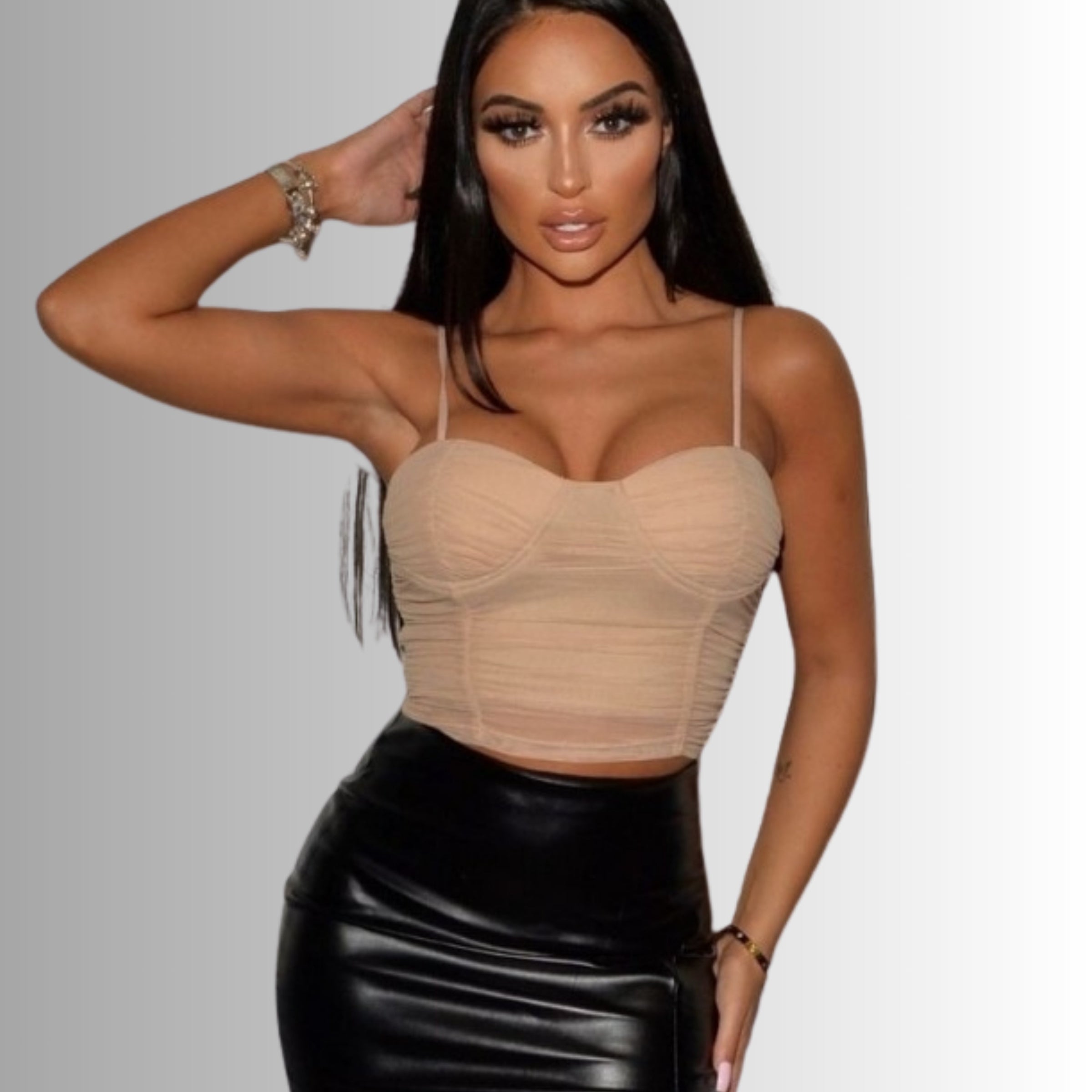 4ever Stunning Skirt Collection Tile. Model wears a faux leather thigh split skirt with a cami chiffon top.