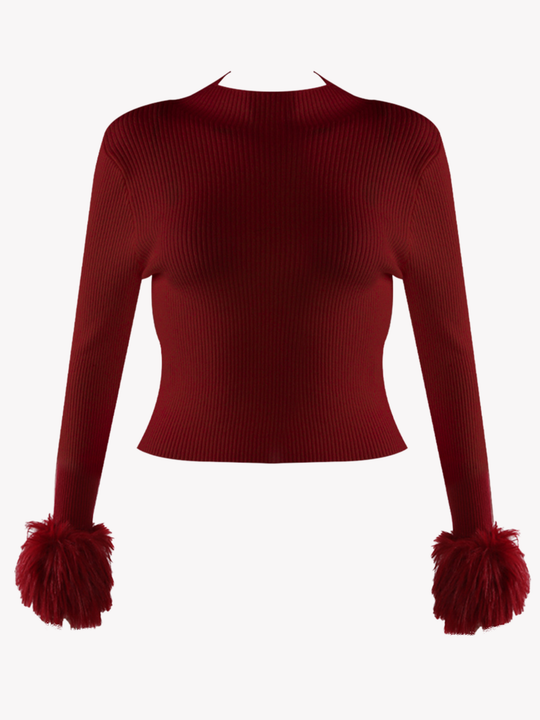 Ghost mannequin wears a red fine knit long sleeve ribbed jumper with red faux fur cuffs.