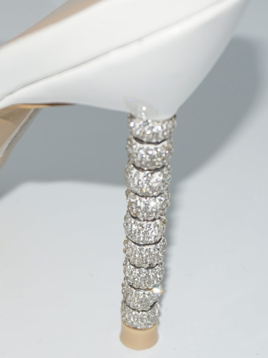 Closeup of the diamante heeded shoe, demonstrating the diamante detailing.