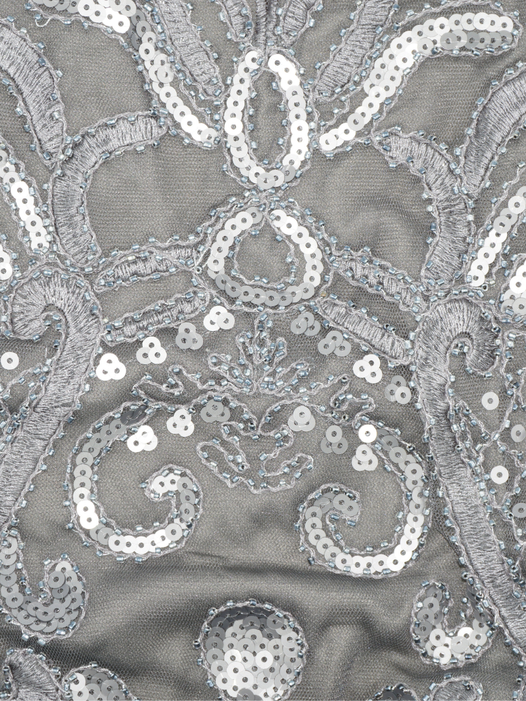 Closeup premium dress sequined grey maxi dress material.