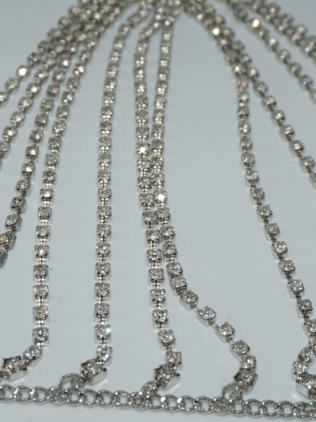 Close up of diamante links of the silver diamante bralette.