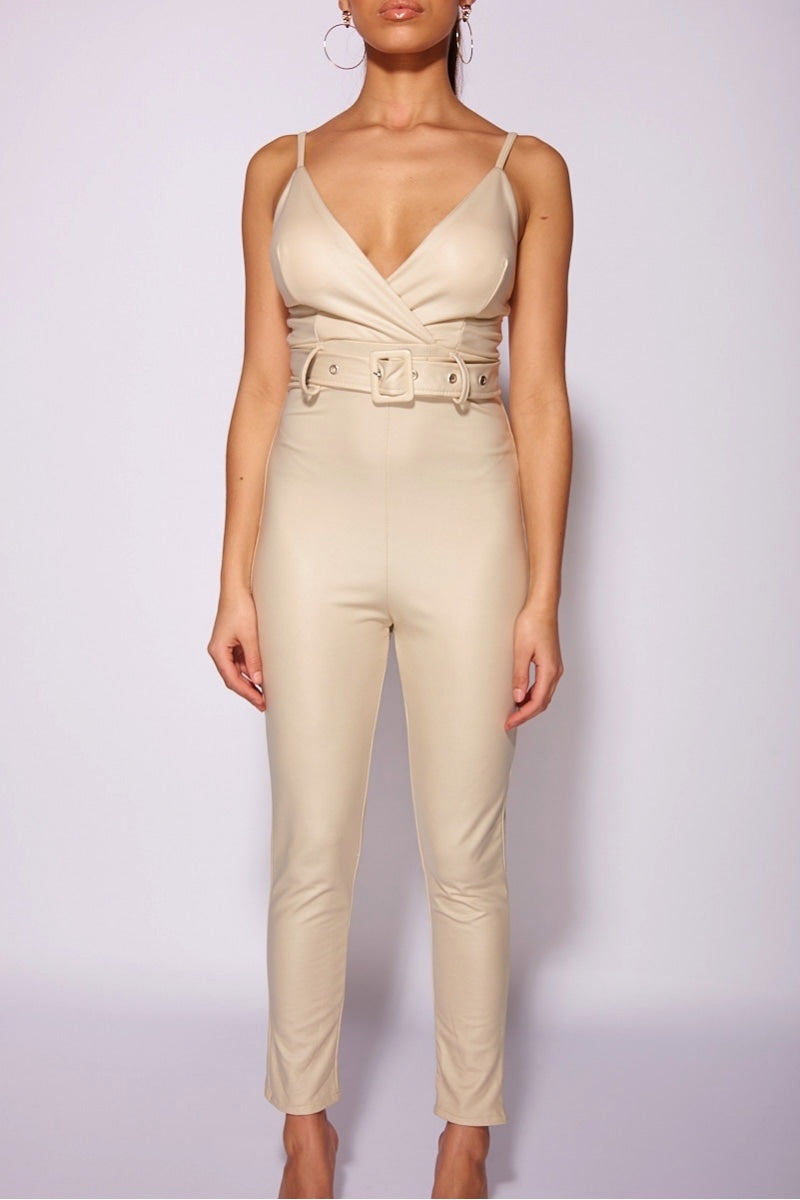beige_faux_leather_wrapover_front_belted_strappy_jumpsuit_Model_Facing_Forwards_hands_to_Sides__