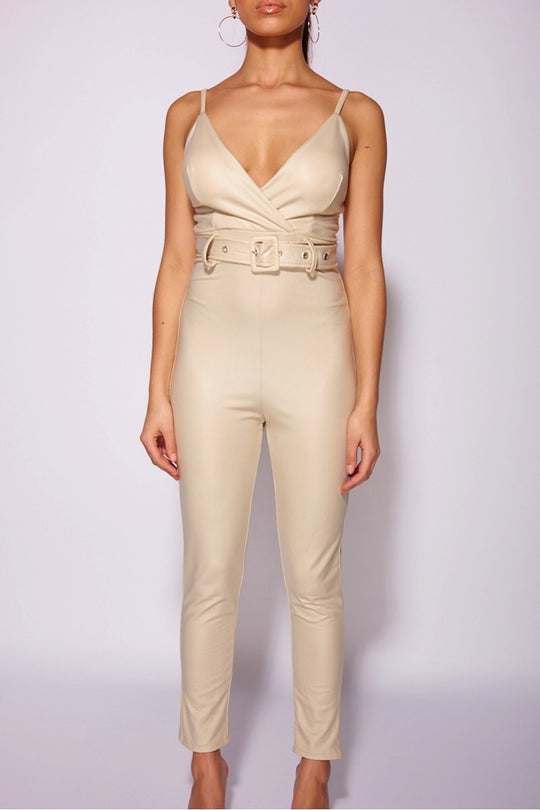 beige_faux_leather_wrapover_front_belted_strappy_jumpsuit_Model_Facing_Forwards_hands_to_Sides__