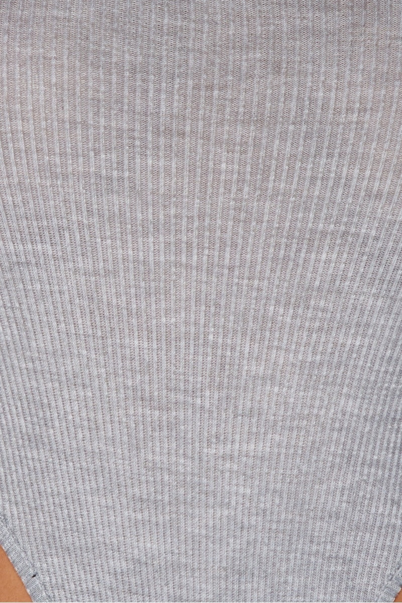 closeup of the grey ribbed material of the high legged grey bodysuit.