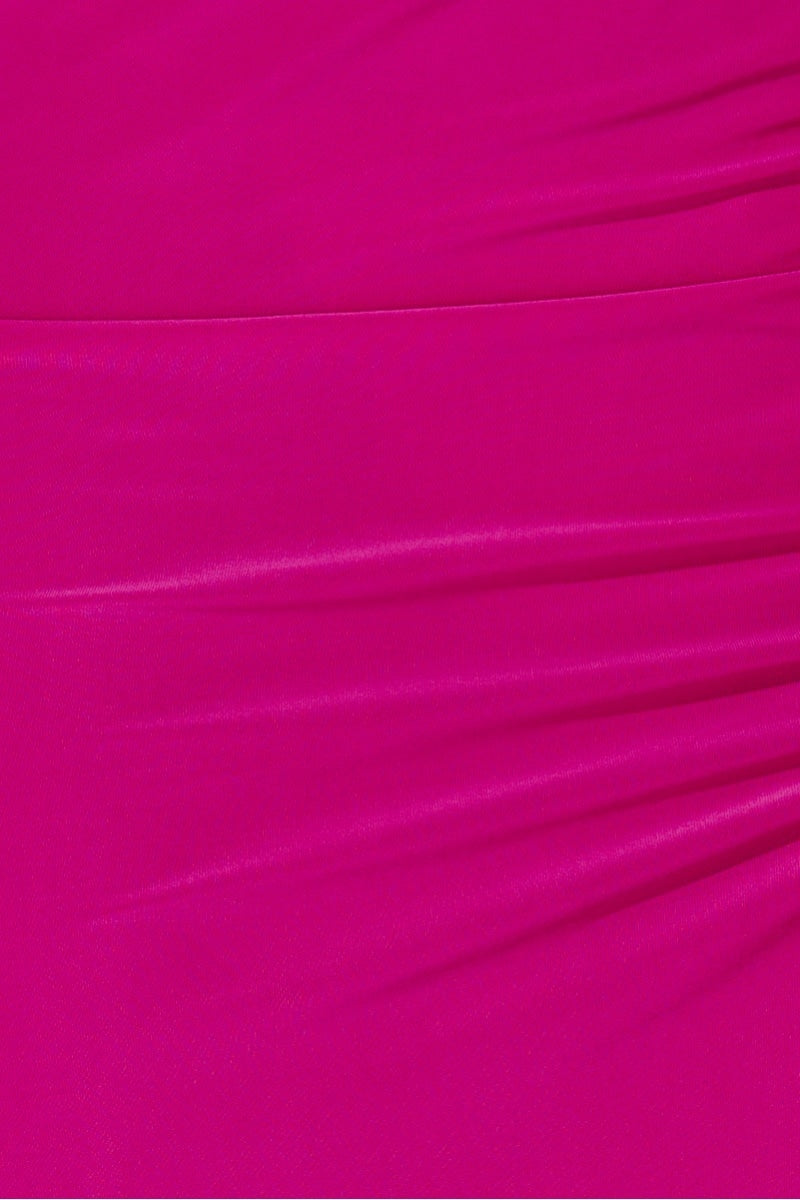 Close up of the slinky magenta material.