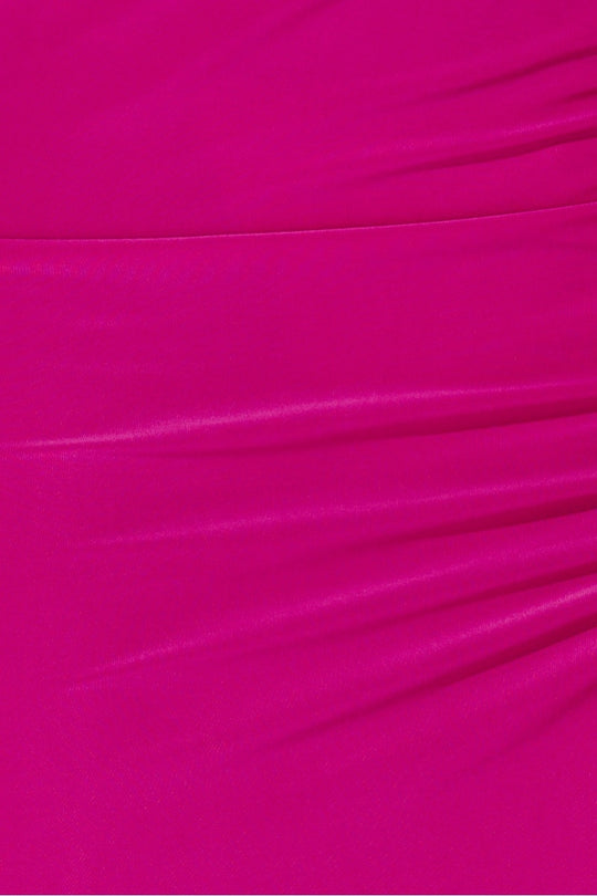 Close up of the slinky magenta material.