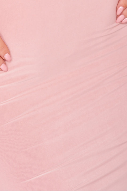 Close up of the pink slinky material.