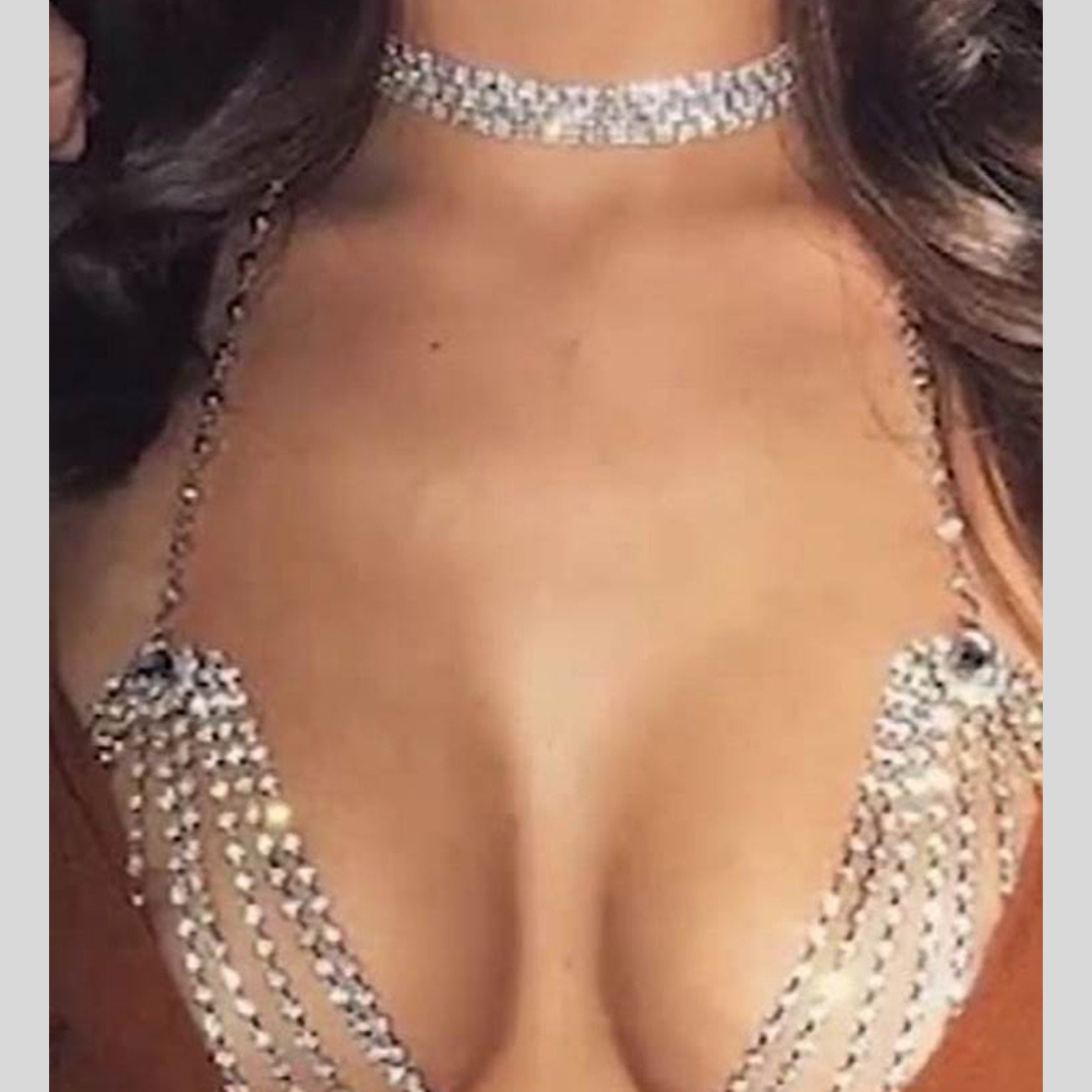 Model wears a diamante chocker and bralette.