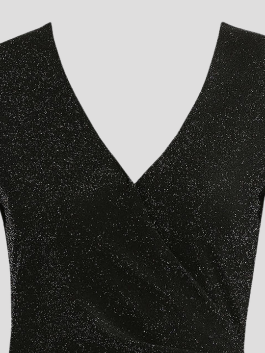 Close up of the wrap front design. Ghost mannequin wears a black lurex midi dress with v neck wrap front, long sleeves  and zip back fastening.  