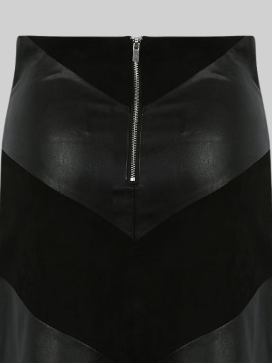 Close up of the faix leather and faux suede panel mini skirt and exposed zip back fastening.