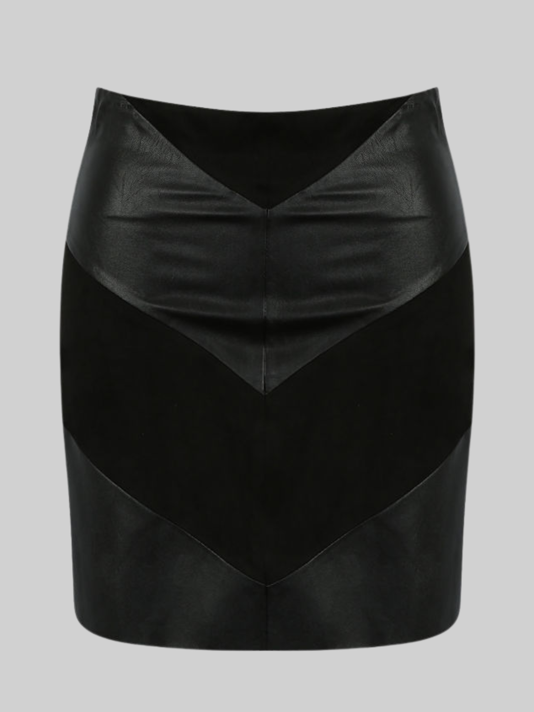 Ghost mannequin wears a black pu fau leather mini skirt, with faxu suede panels. The ghost mannequin stands in front of a plain bakground and faces forward, the front of the skirt can be seen, including teh faux suede panel inserts. 