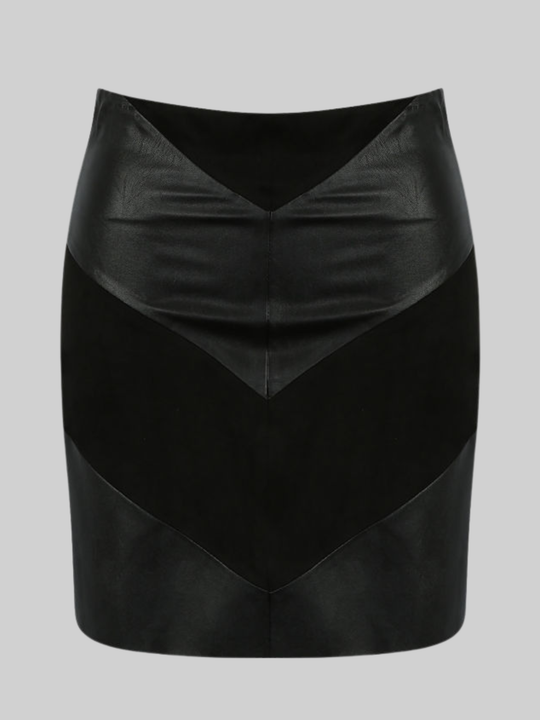 Ghost mannequin wears a black pu fau leather mini skirt, with faxu suede panels. The ghost mannequin stands in front of a plain bakground and faces forward, the front of the skirt can be seen, including teh faux suede panel inserts. 