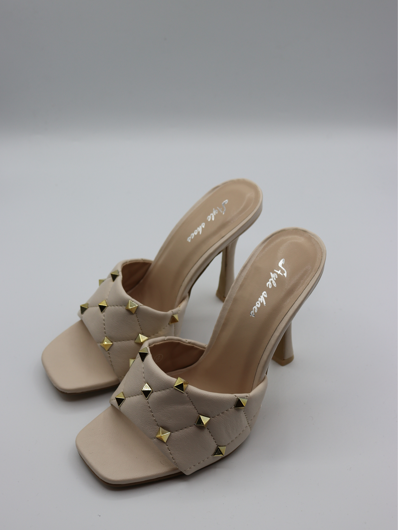 Studded clearance heeled mules
