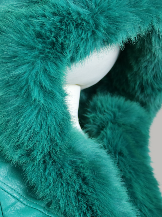 Close up of green faux fur hood. 
