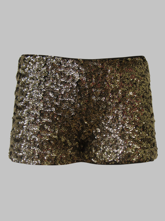 Ghost mannequin wears a  gold sequin hot pants. The ghost mannequin faces forward, the front of the gold sequined shorts can be seen.