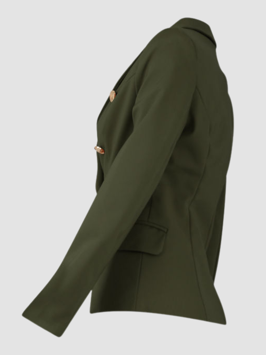 host mannequin stands in front of a plain background. The ghost mannequin wears a double breasted khaki  blazer with gold military button detailing and faux side pockets. The ghost mannequin stands to the side, the side of the blazer can be seen.
