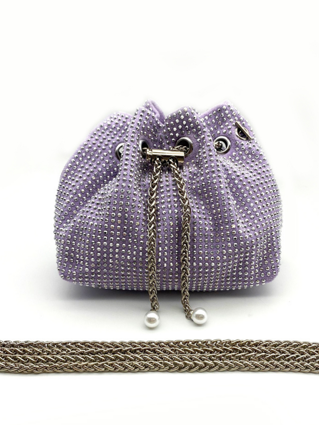 Purple studed bag silver chain, drawstring bag, which has an embelished design and silver chain.  The purple studed bag is placed in front of a plain background and the silver chain attachment is placed in front of the bag. 