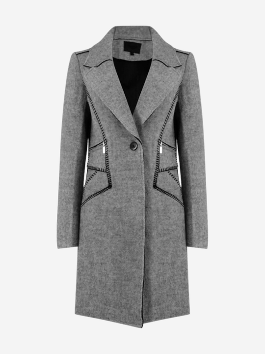 Ghost manequin stands in front of a plain background, the manequin wears a grey woolen coat with single front button fastening and grey tweed trim. The front of the coat can be seen, including teh single button fastening and exposed woven trim design and woolen lapel.