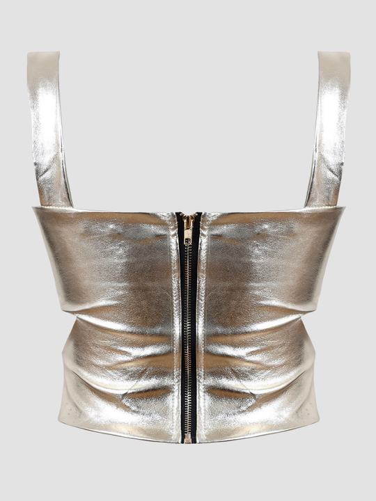 Ghost mannequin wears a faux leather gold metallic crop top with thick gold metallic shoulder straps, wrap front design and cut out sides and zip back fastening. The ghost mannequin stands with his back to the camera, the zip back fastening and thick gold shoulder straps can be seen. 