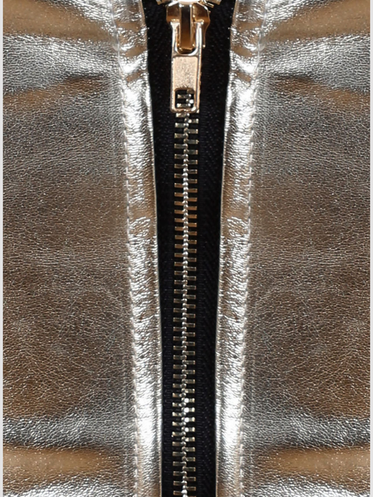 Close up, of exposed zip back fastening.