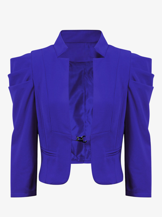 Ghost mannequin stands in front of a plain background, the ghost mannequin wears a royal blue cropped blazer, with long sleeves and puffed sleeves. The blazer has a front  hook clasp fastening  and faux front side pockets. The ghost mannequin faces forward, the front of the blazer can be seen, including the front hook fastening.