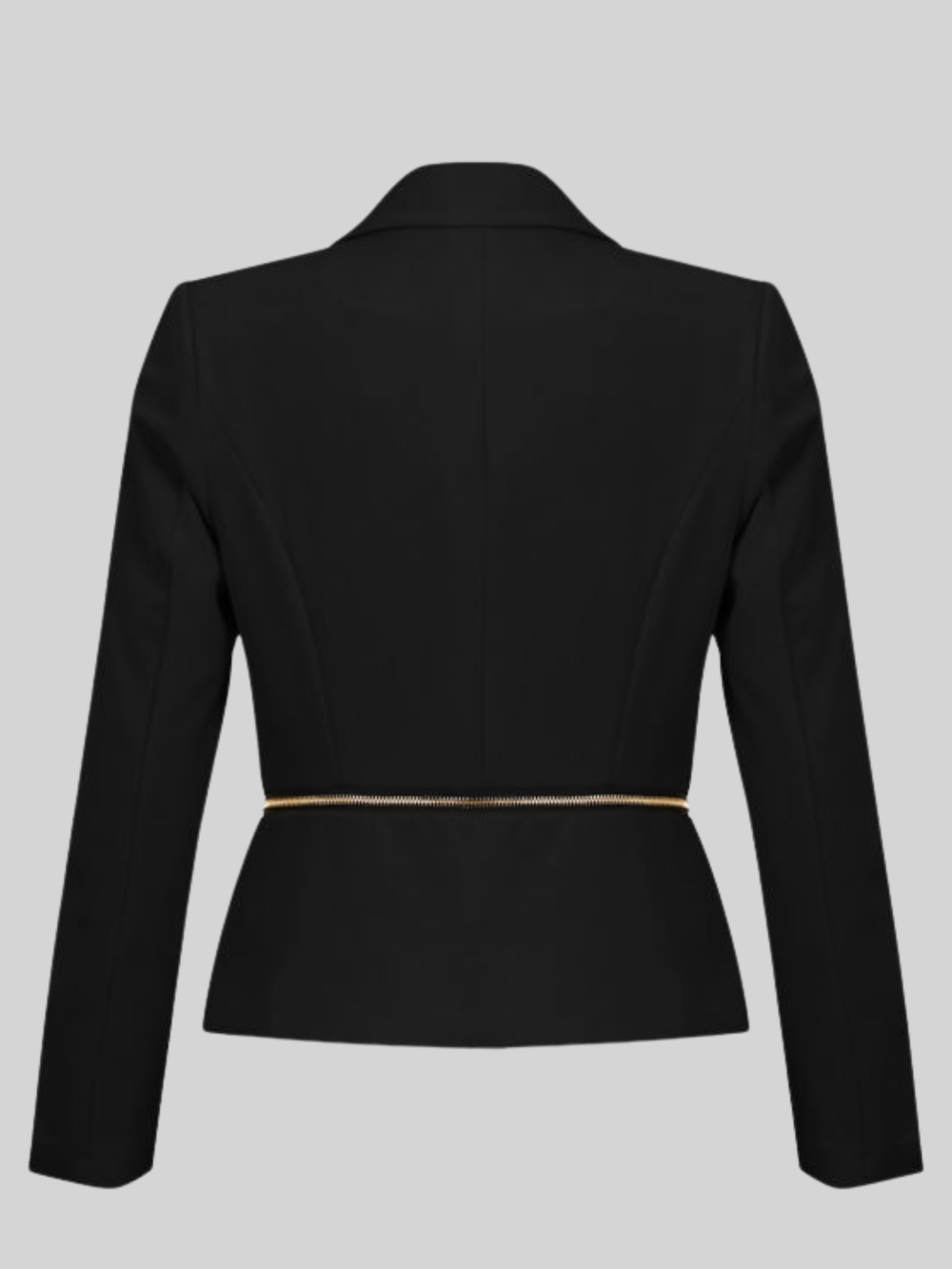 Ghost mannequin stands in front of the black blazer,  with single  front button fastening and exposed side zip design and long sleeves. The ghost mannequin stands with its back to the camera, the back of the  fitted luxe blazer, the gold exposed zip can be seen across the waist.