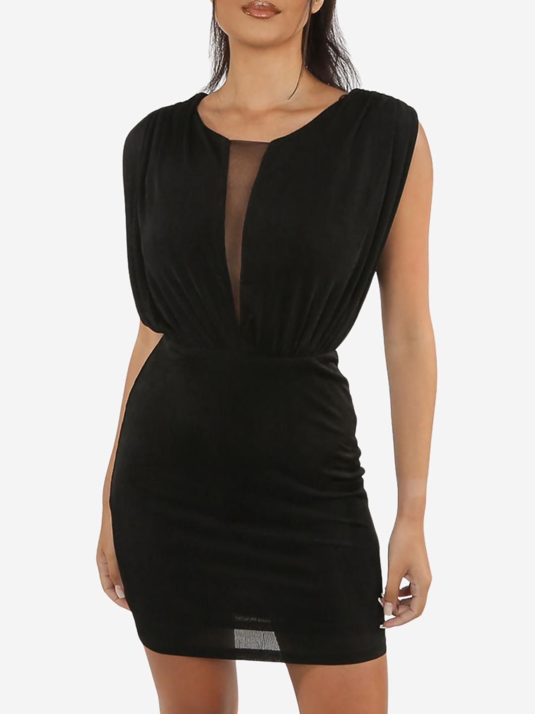 Mid length shot. Model stands in front of a plain background, she wears a black mini dreess with a round neckline,  a front sheer panel  and a sleevless design.