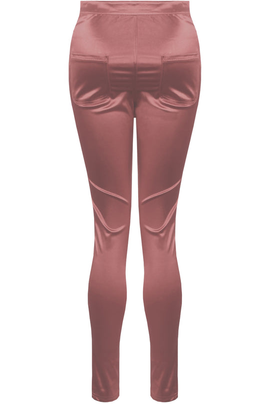  Ghost manequin wears a pink satin skinny fit trousers with front button closure. The Ghost manequin stands so that the back of the trousers and the back pockets is visible. 