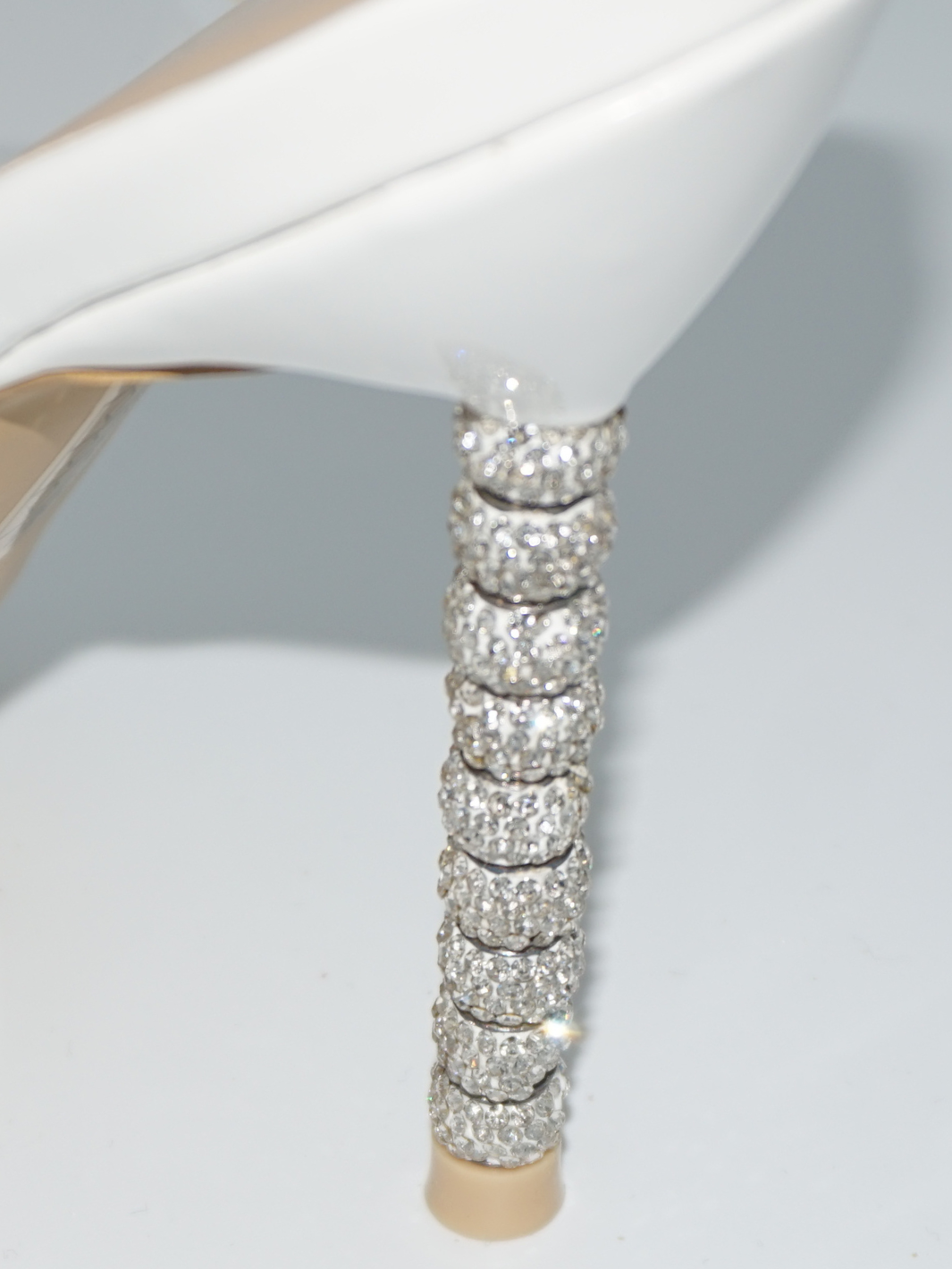 Closeup of the diamante heeded shoe, demonstrating the diamante detailing. 