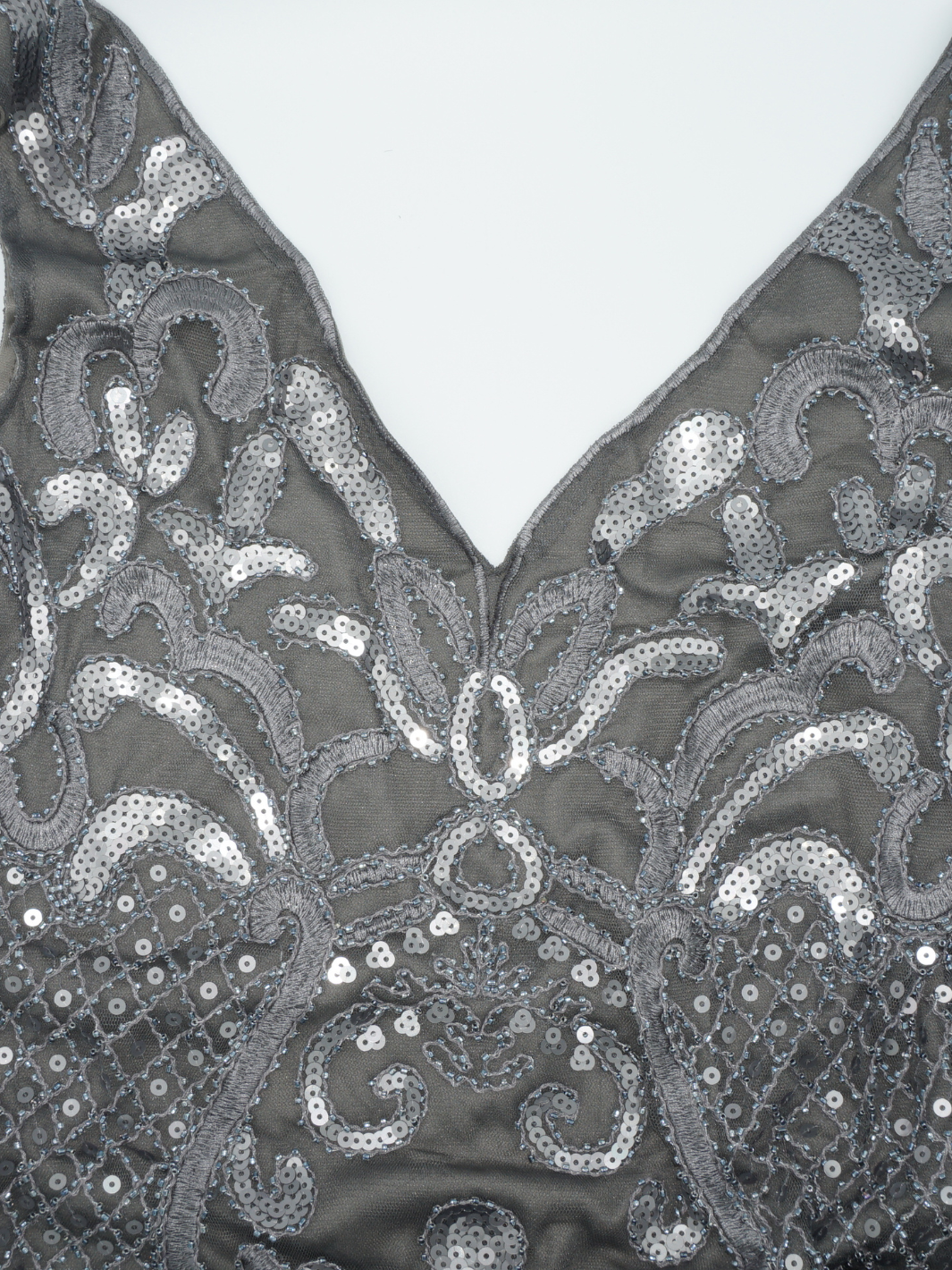 Closeup premium dress sequined grey maxi dress material. 