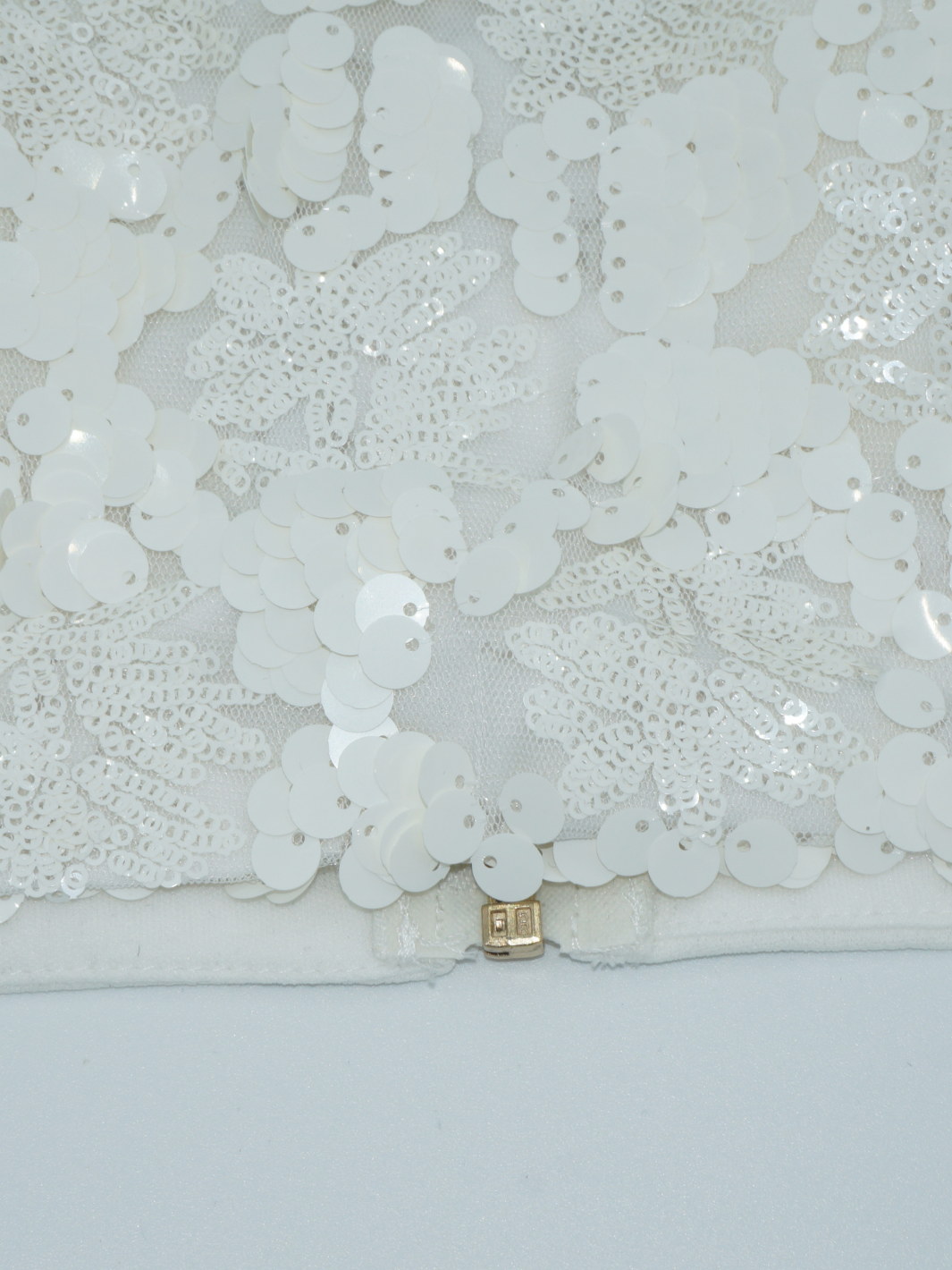 Close up of the sequined bralette.