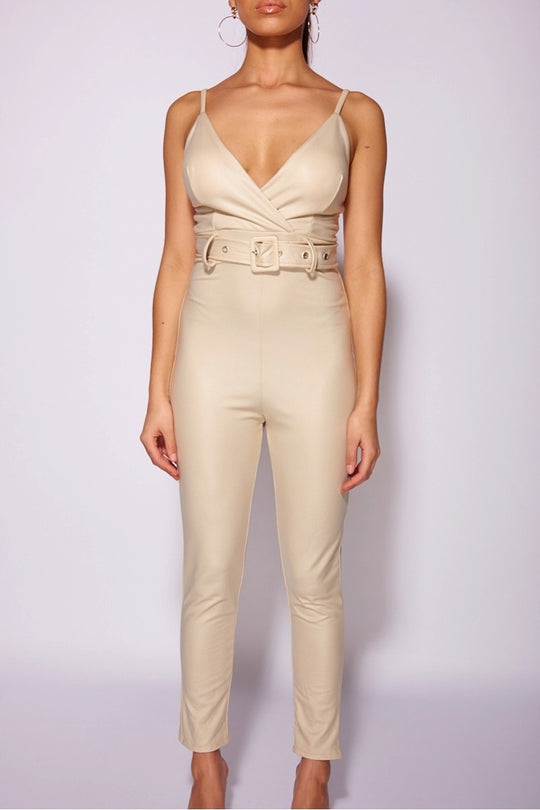    beige_faux_leather_wrapover_front_belted_strappy_jumpsuit_Model_Facing_Forwards_hands_to_Sides__