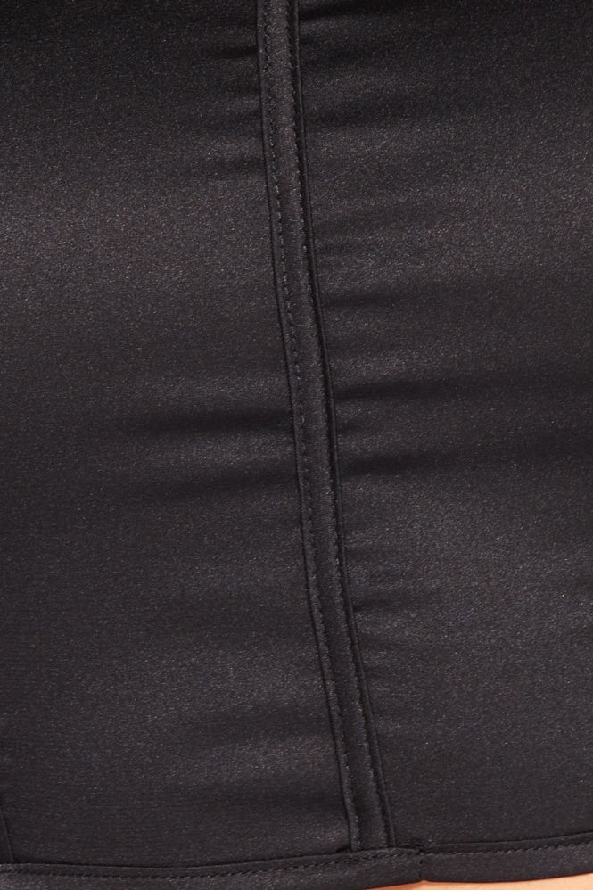 Close up of satin balck material with the steel bone detailing. 