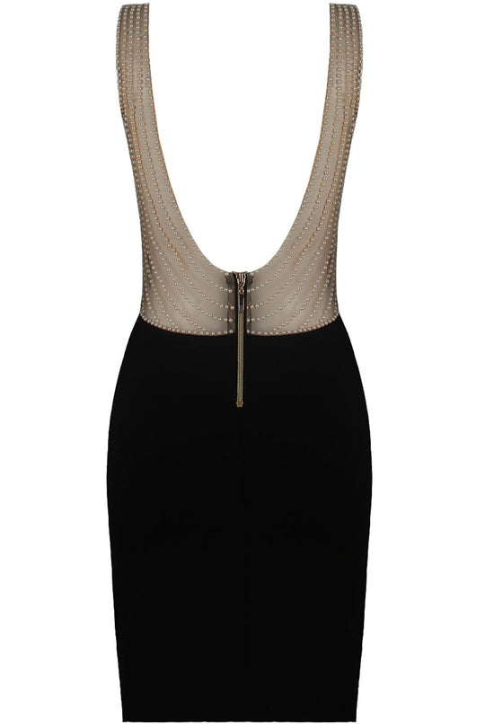Ghost manequin wears a 4ever Stunning Premium Deluxe Dress with sweat heart neckline, with clear mesh at the plunging neckline. The dress has pearl detailing at the the dress straps and at the low plunging back. The picture shows the deep plunging back of the dress with the pearl detailing and gold chunky zip fastening. 
