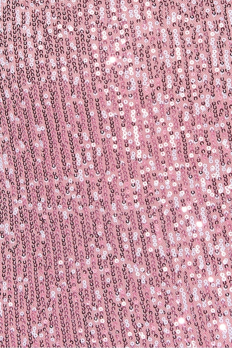 Close up of pink sequined material.